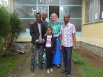 Group shot outside # 1 with Library staff member, Abebe and Library manager, Gizaw