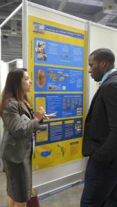 Rita Puig discussing poster during IFLA